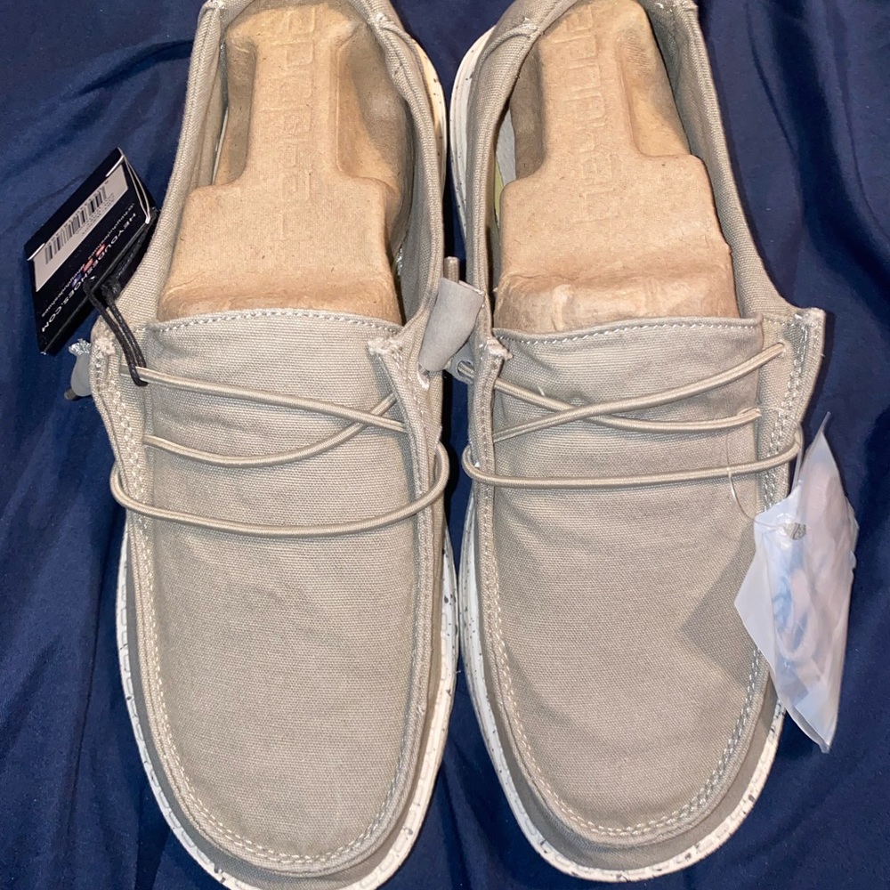 Brand new, never worn!! HEYDUDE Wendy in color grey. Size 8 in women’s.
